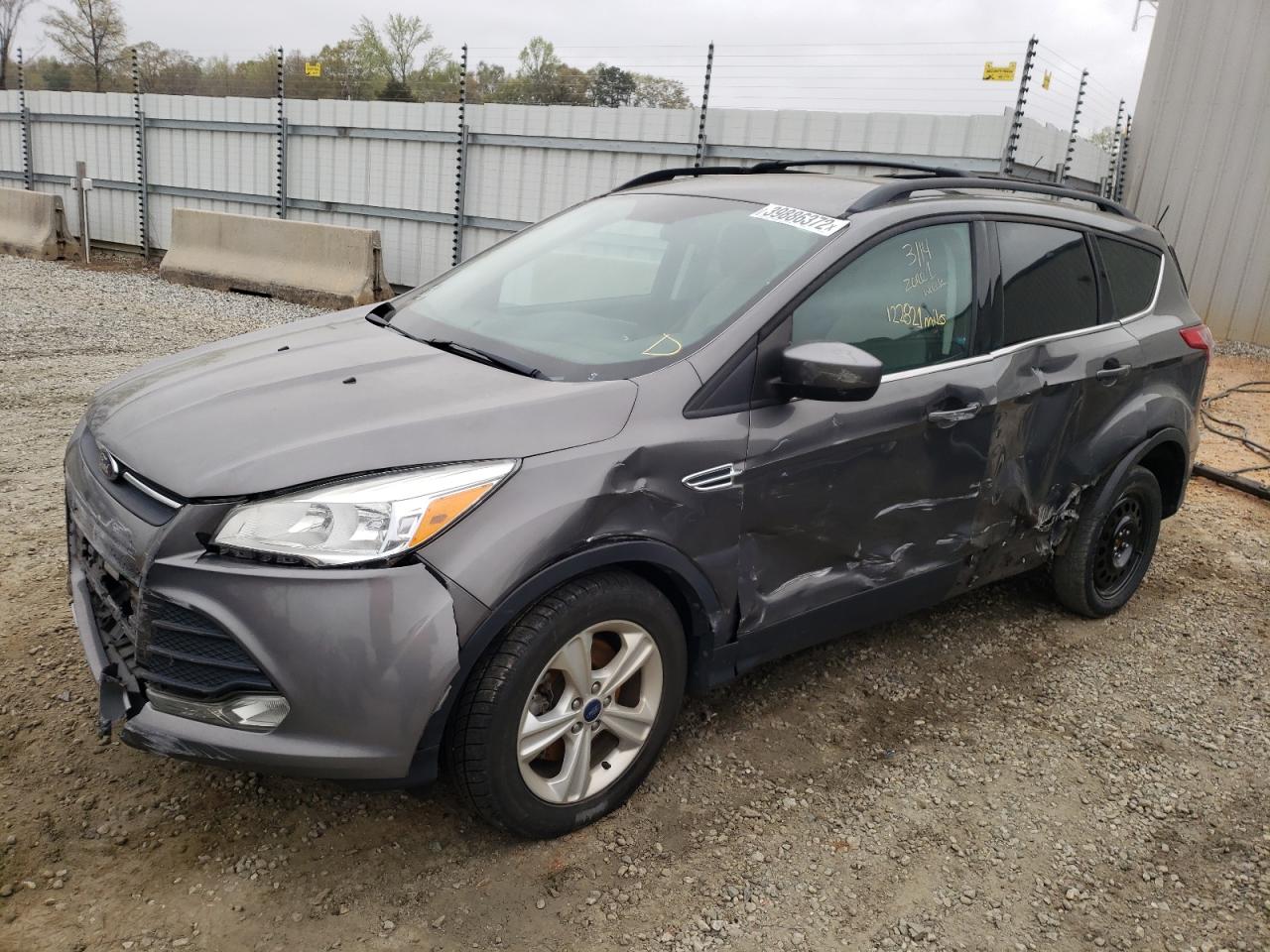 Photo 2 from auction – 2014 FORD ESCAPE SE with VIN 1FMCU9GX7EUA94494