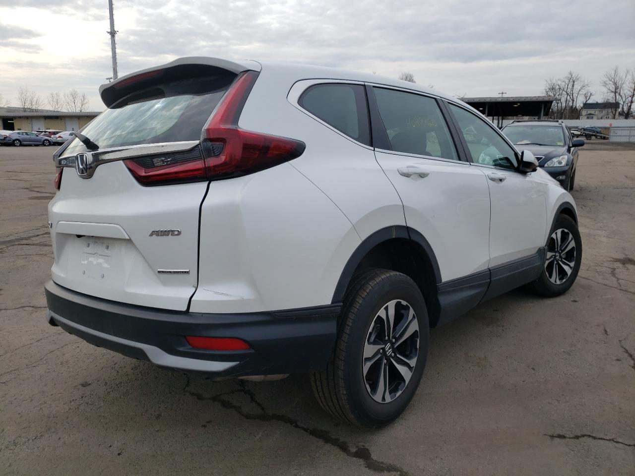 Photo 4 from auction – 2021 HONDA CR-V SE with VIN 5J6RW2H72ML026357