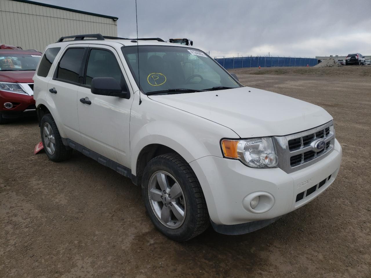 FORD ESCAPE XLT 2011 with VIN 1FMCU9DG0BKB81052 - Photo from auction