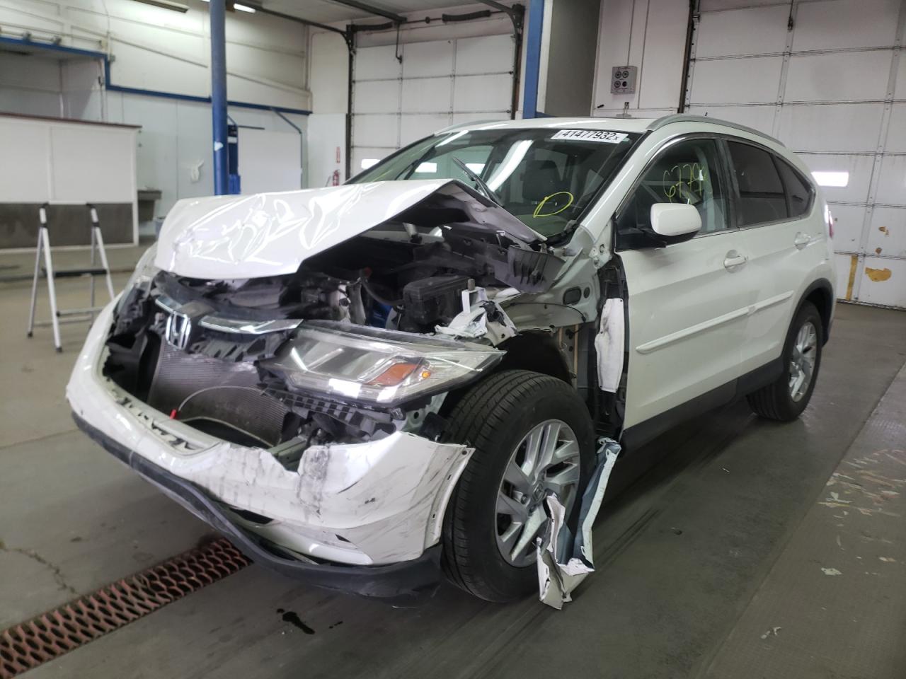 Photo 2 from auction – 2015 HONDA CR-V EXL with VIN 5J6RM4H78FL043880
