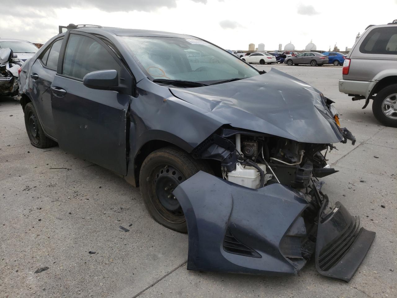 TOYOTA COROLLA L 2017 with VIN 5YFBURHEXHP574138 - Photo from auction