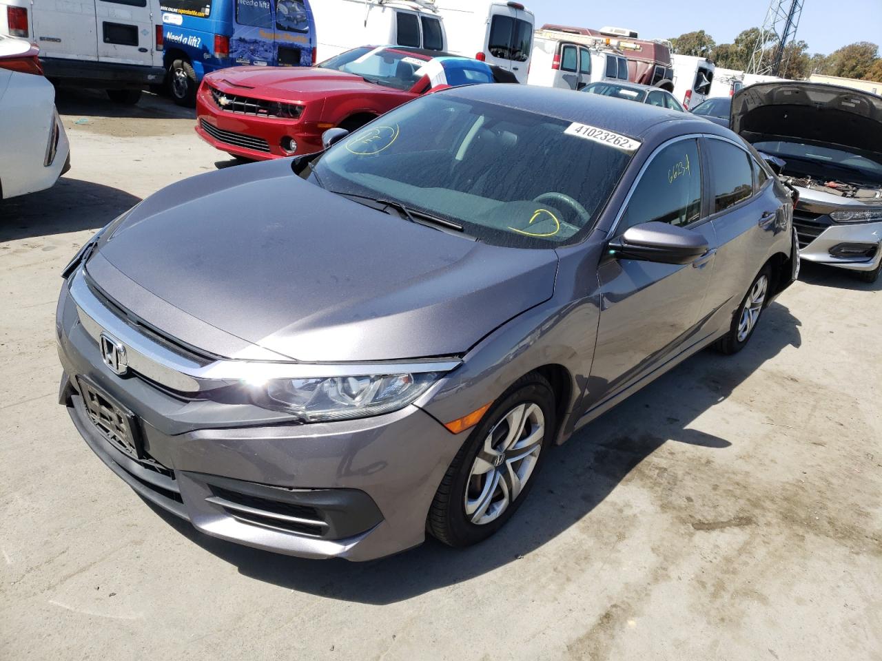 Photo 2 from auction – 2018 HONDA CIVIC LX with VIN 19XFC2F5XJE201140