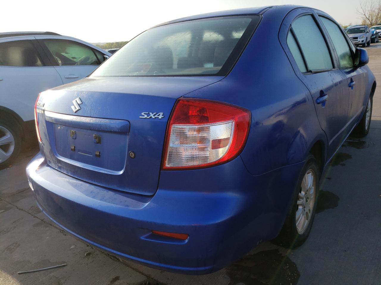 Foto 4 de la subasta – 2012 SUZUKI SX4 LE con VIN JS2YC5A3XC6302872
