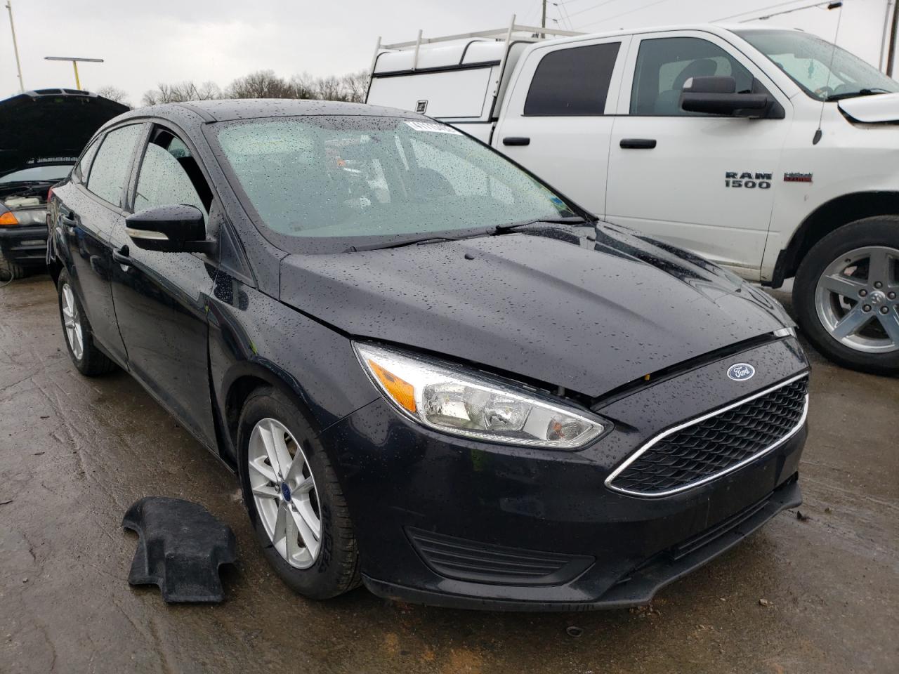 FORD FOCUS SE 2015 with VIN 1FADP3F26FL373418 - Photo from auction