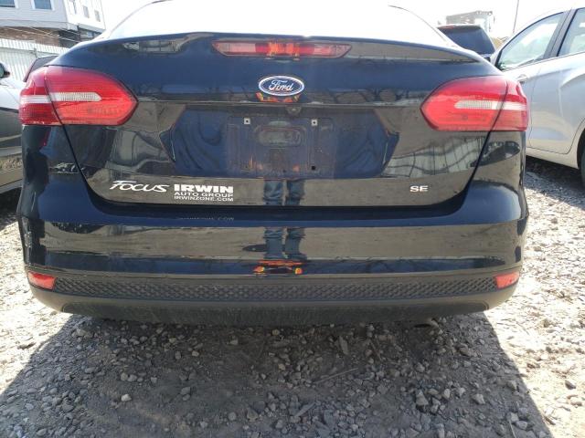 Photo 9 from auction – 2018 FORD FOCUS SE with VIN 1FADP3F24JL306597