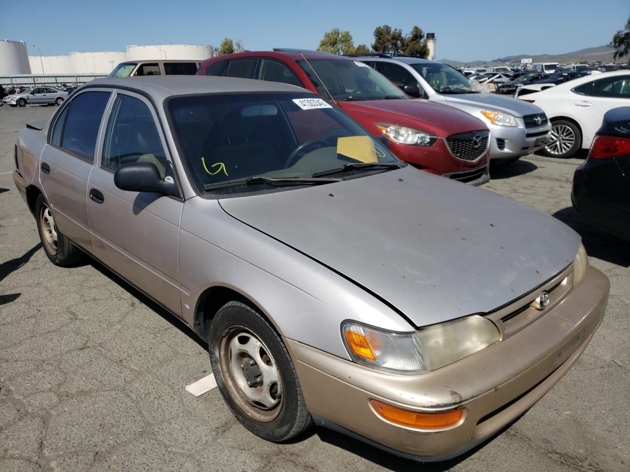 TOYOTA COROLLA BA 1997 with VIN 1NXBA02E9VZ590404 - Photo from auction