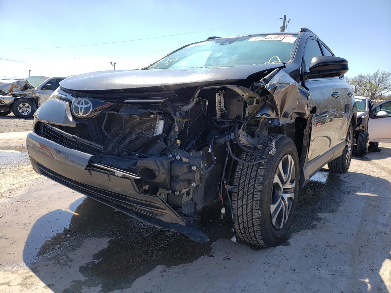 Photo 9 from auction – 2017 TOYOTA RAV4 LE with VIN JTMZFREV2HJ712580