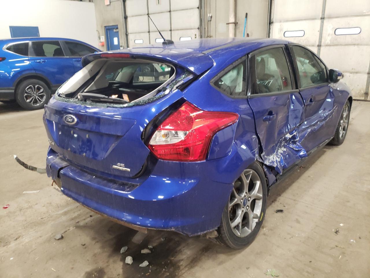 Foto 4 de la subasta – 2014 FORD FOCUS SE con VIN 1FADP3K20EL169282