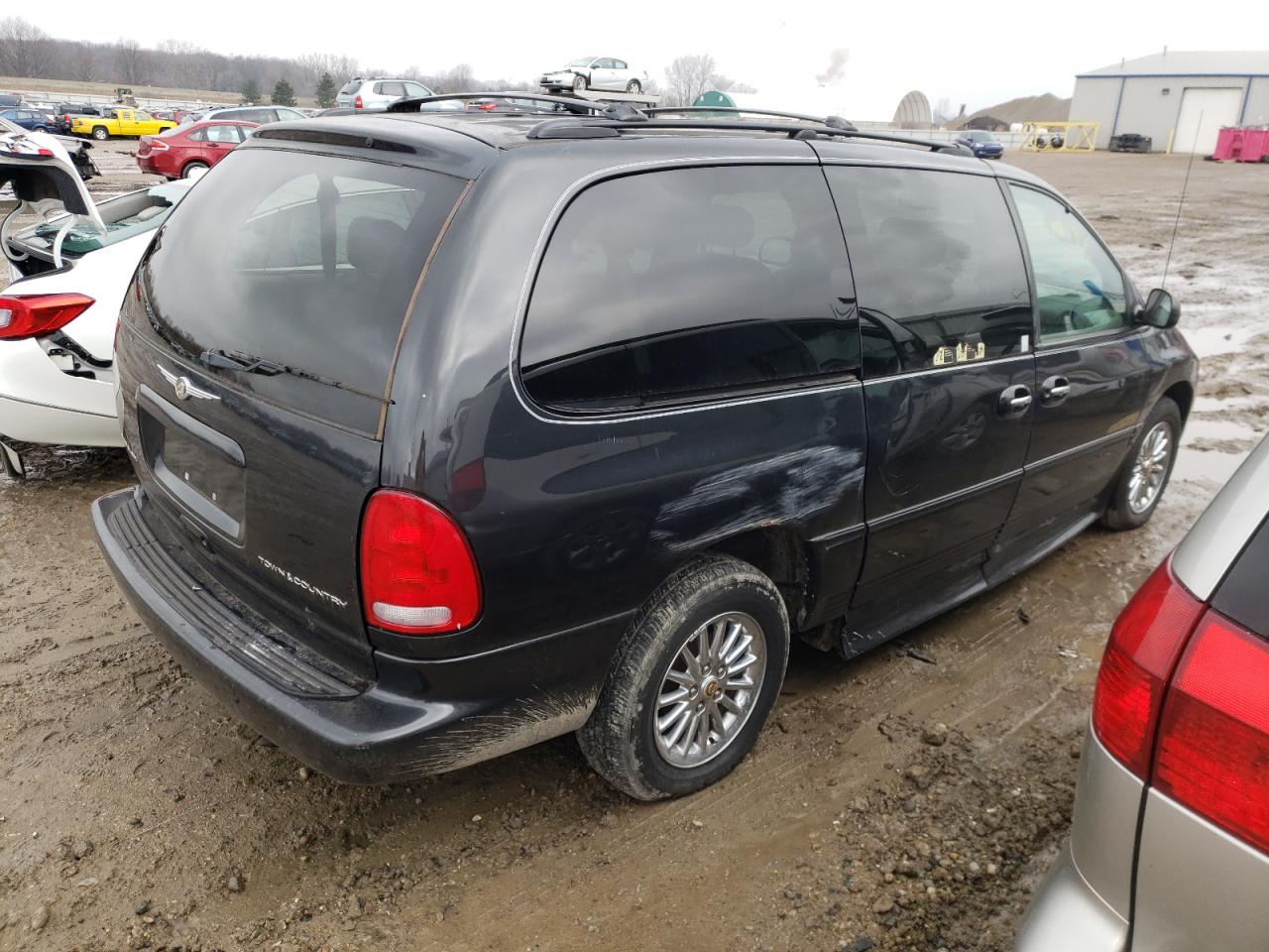 Photo 4 from auction – 1999 CHRYSLER TOWN & COU with VIN 1C4GP64L3XB832142