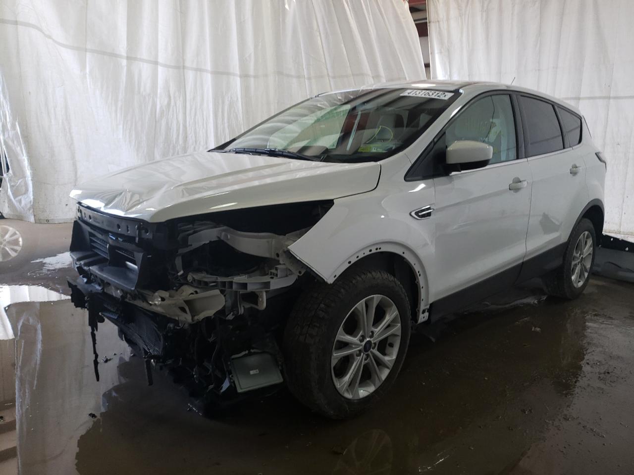 Photo 2 from auction – 2017 FORD ESCAPE SE with VIN 1FMCU9GD0HUE20307