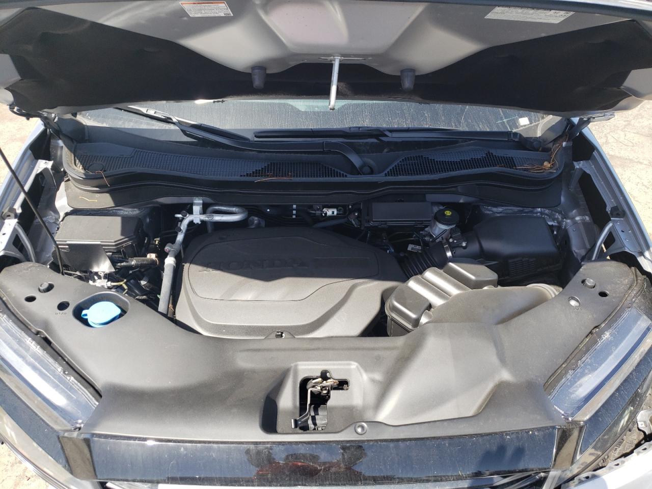 Photo 7 from auction – 2022 HONDA RIDGELINE with VIN 5FPYK3F10NB007058