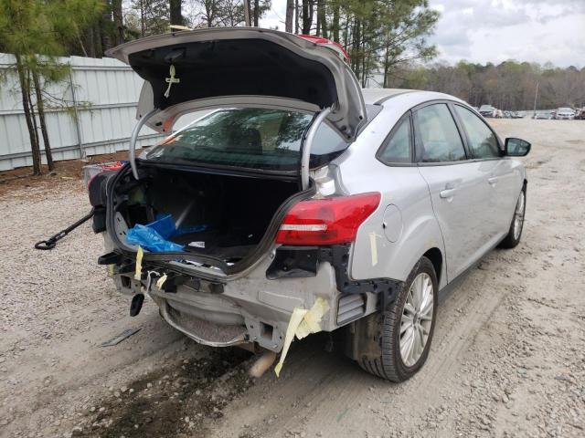 Photo 4 from auction – 2018 FORD FOCUS with VIN 1FADP3H2XJL318976