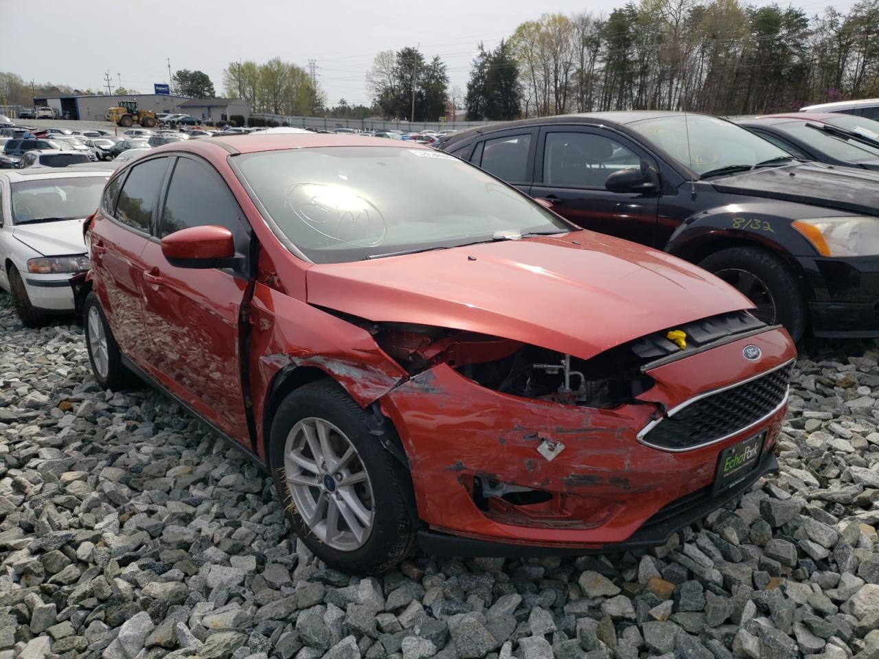 FORD FOCUS SE 2018 with VIN 1FADP3K21JL310497 - Photo from auction