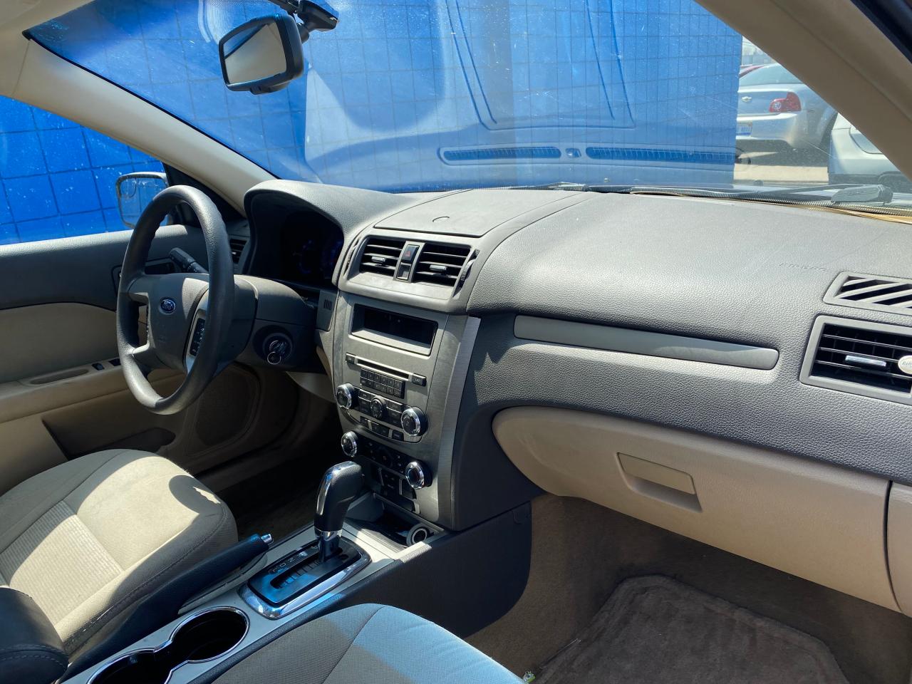 Photo 9 from auction – 2011 FORD FUSION SE with VIN 3FAHP0HA4BR148172