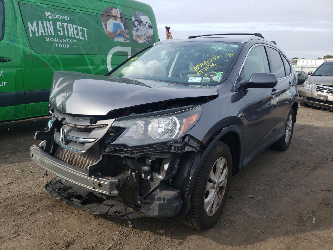Photo 2 from auction – 2014 HONDA CR-V EXL with VIN 2HKRM4H77EH692076