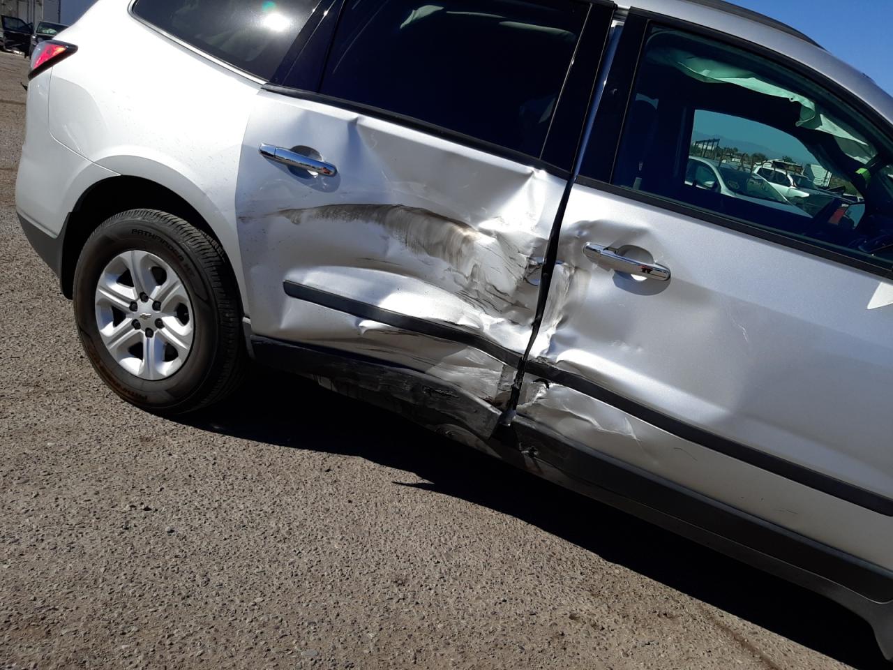 Photo 9 from auction – 2013 CHEVROLET TRAVERSE L with VIN 1GNKRFED0DJ129330