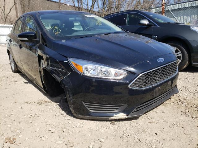 FORD FOCUS SE 2018 with VIN 1FADP3F24JL306597 - Photo from auction