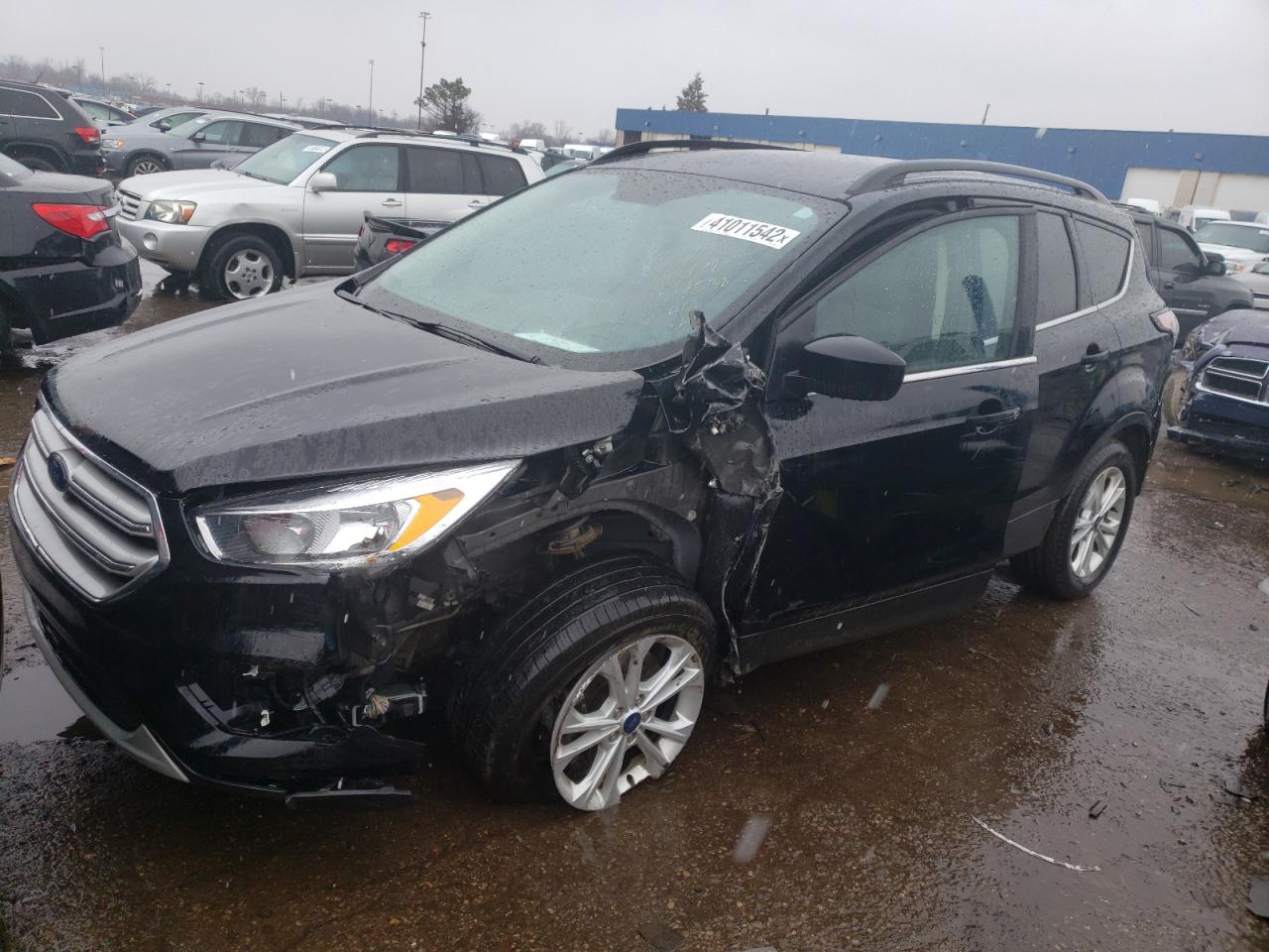Photo 2 from auction – 2018 FORD ESCAPE SE with VIN 1FMCU9GDXJUD19538