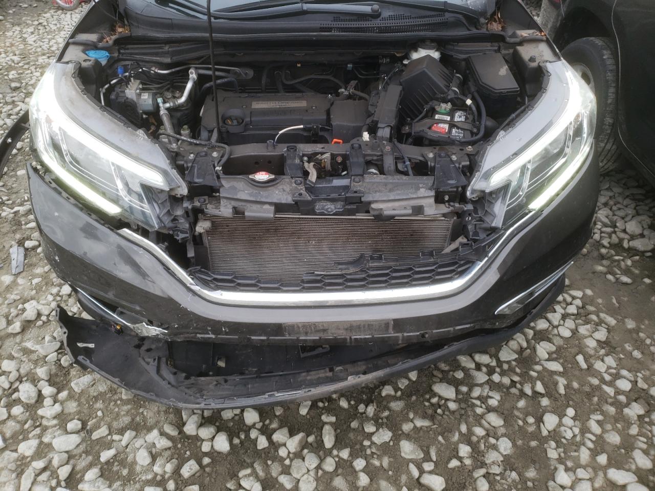 Photo 7 from auction – 2015 HONDA CR-V EX with VIN 2HKRM4H58FH660284
