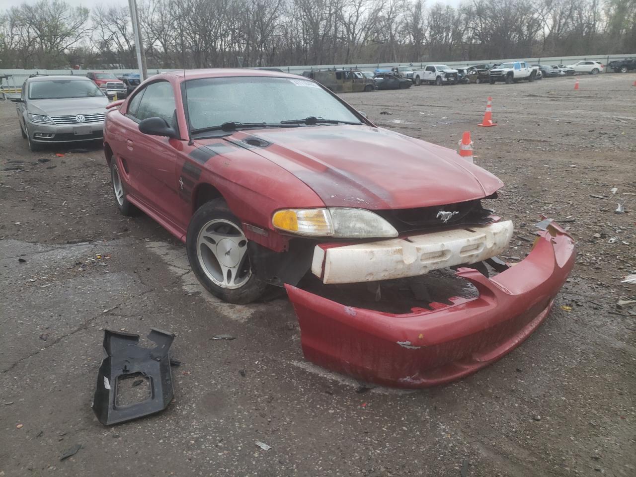 FORD MUSTANG 1998 with VIN 1FAFP4048WF171753 - Photo from auction