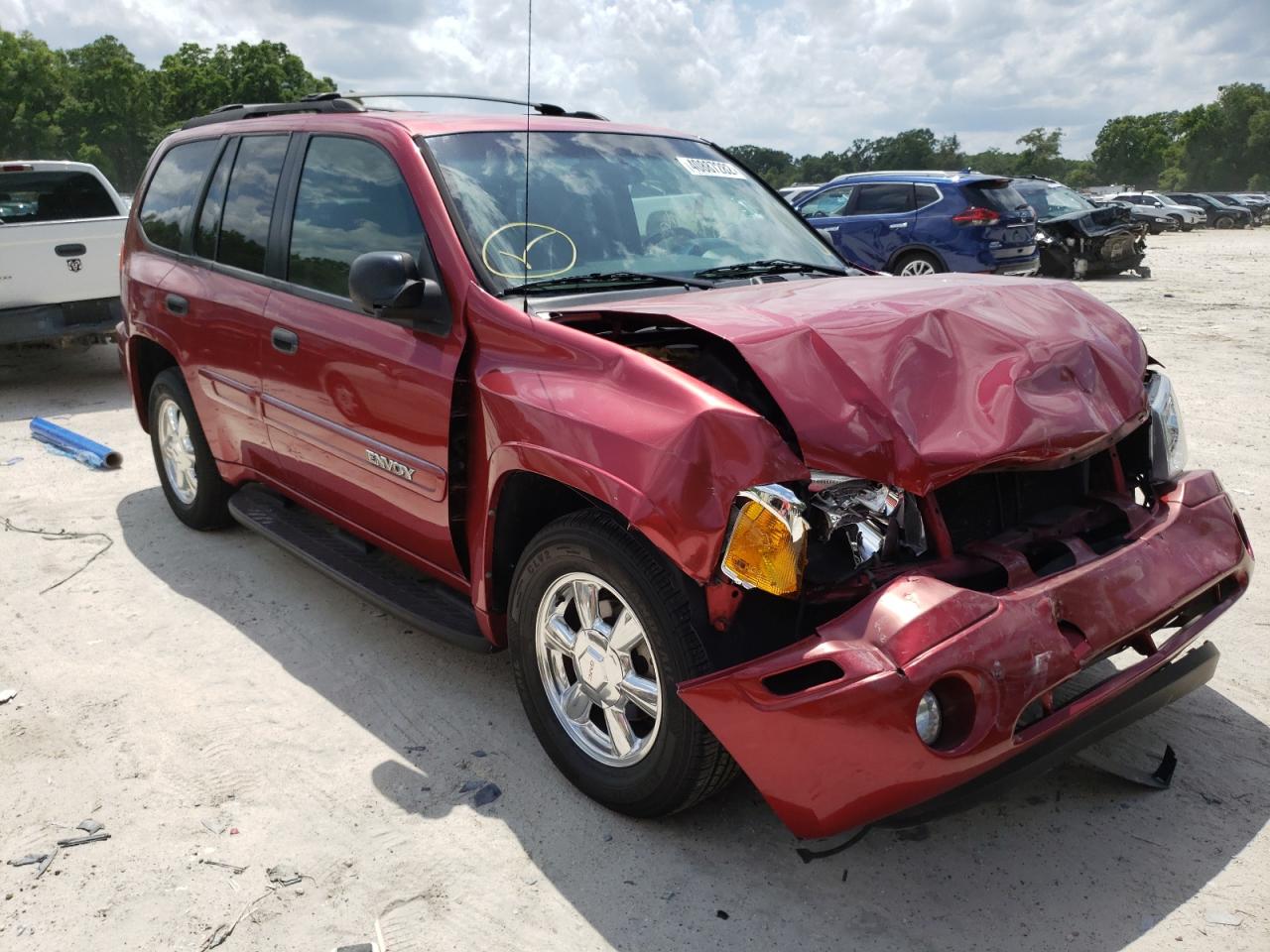 GMC ENVOY 2004 with VIN 1GKDS13S942393896 - Photo from auction