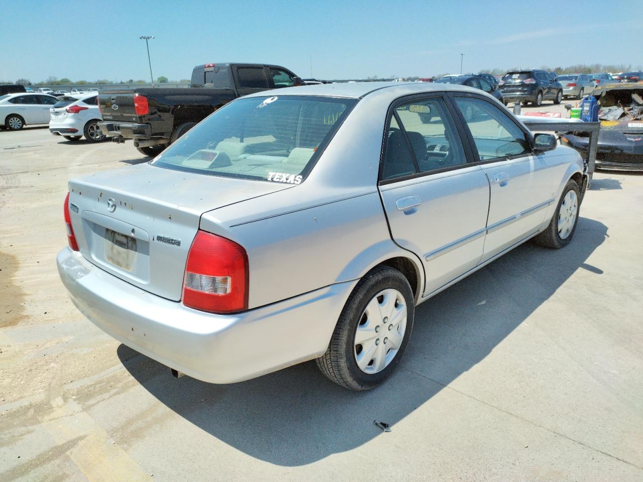 Фото 4 с аукциона – 2001 MAZDA PROTEGE LX с VIN JM1BJ225610430739