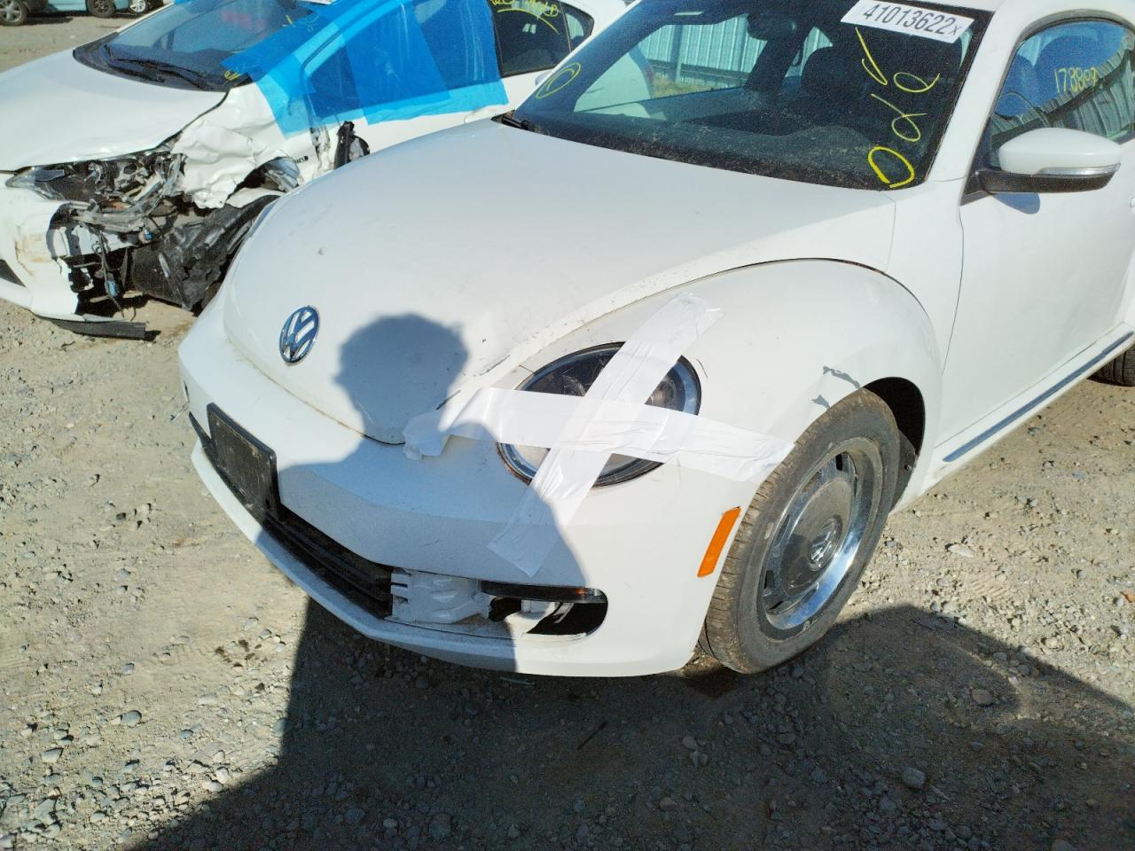 Photo 9 from auction – 2012 VOLKSWAGEN BEETLE with VIN 3VWJP7ATXCM632682