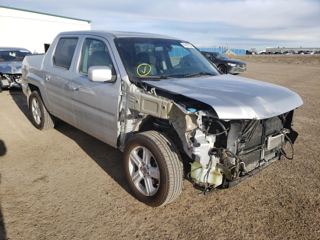 HONDA RIDGELINE 2013 with VIN 5FPYK1F59DB501926 - Photo from auction