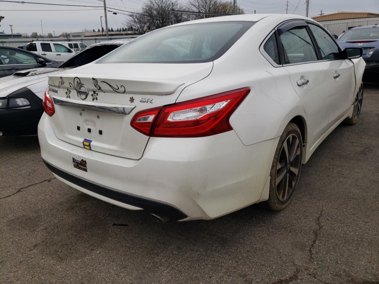 Photo 4 from auction – 2016 NISSAN ALTIMA 2.5 with VIN 1N4AL3AP4GC117569