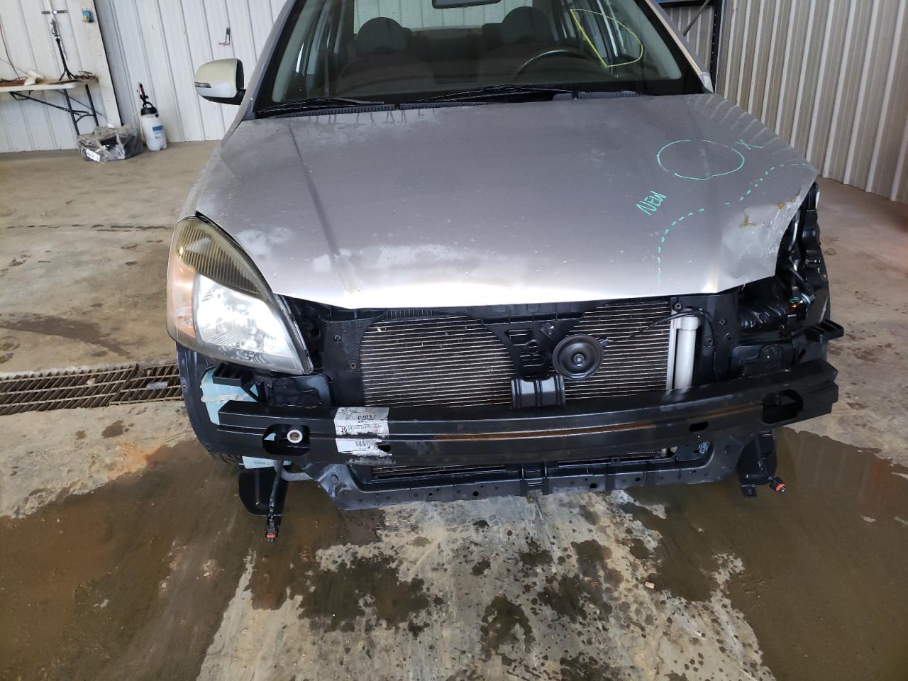 Photo 9 from auction – 2011 KIA RIO BASE with VIN KNADH4A38B6949383