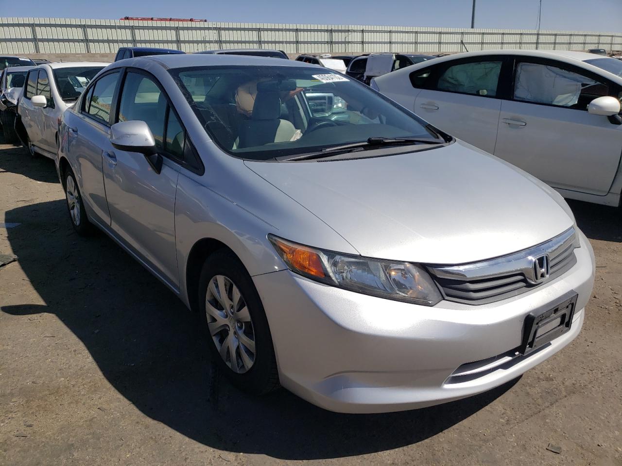 HONDA CIVIC LX 2012 with VIN 2HGFB2F55CH558592 - Photo from auction