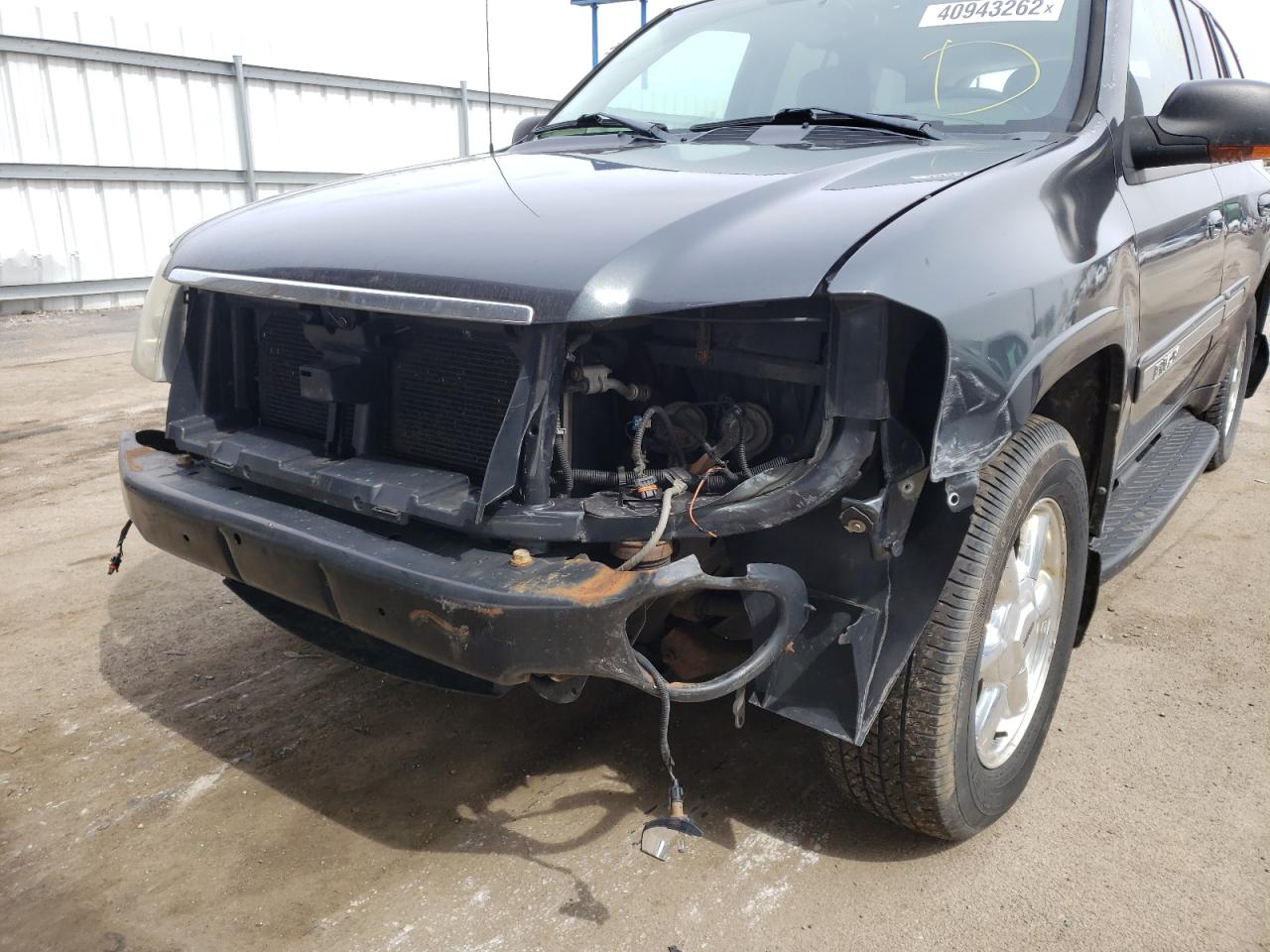 Photo 9 from auction – 2005 GMC ENVOY with VIN 1GKDT13SX52338243