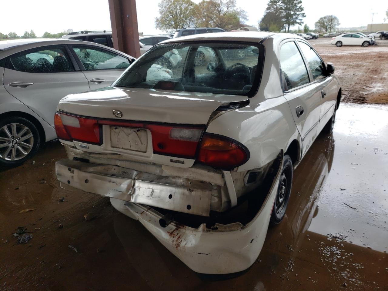Photo 4 from auction – 1998 MAZDA PROTEGE DX with VIN JM1BC1410W0211619