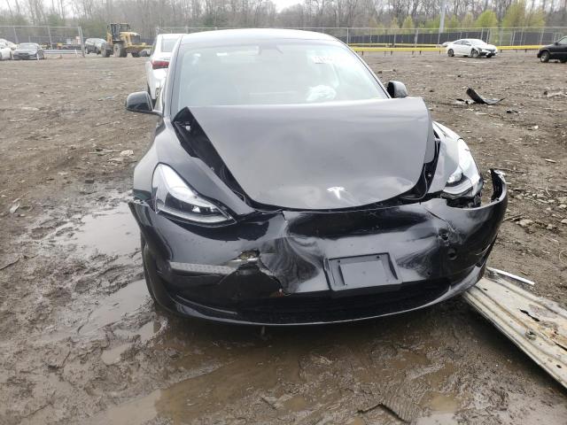 Photo 9 from auction – 2021 TESLA MODEL 3 with VIN 5YJ3E1EA0MF086357