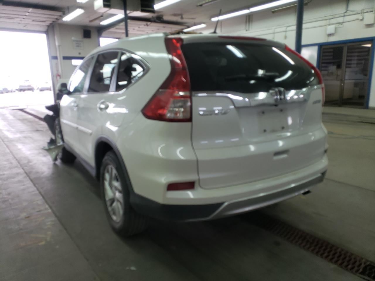 Photo 3 from auction – 2015 HONDA CR-V EXL with VIN 5J6RM4H78FL043880