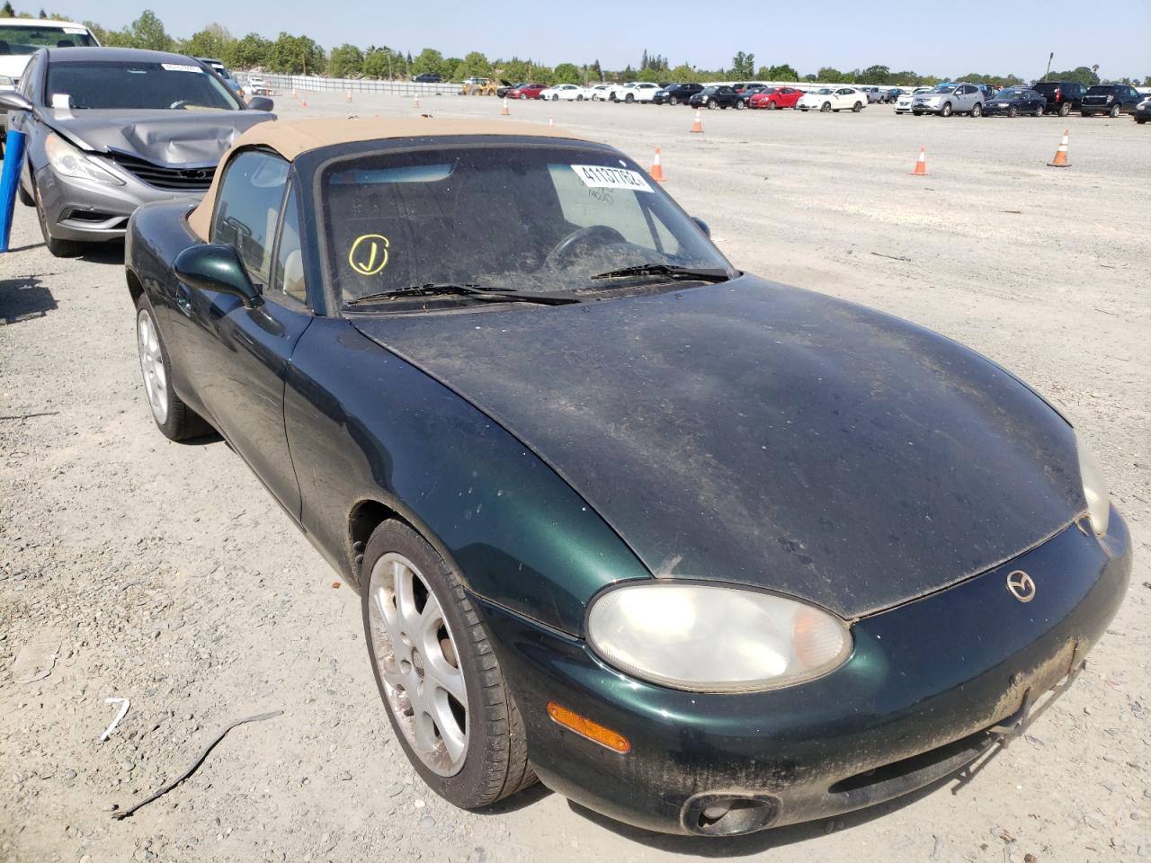 Photo 9 from auction – 1999 MAZDA MX-5 MIATA with VIN JM1NB3530X0127121