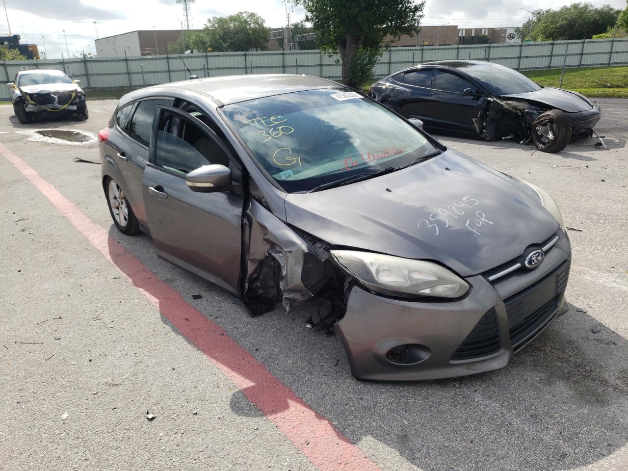 FORD FOCUS SE 2013 with VIN 1FADP3K2XDL359895 - Photo from auction