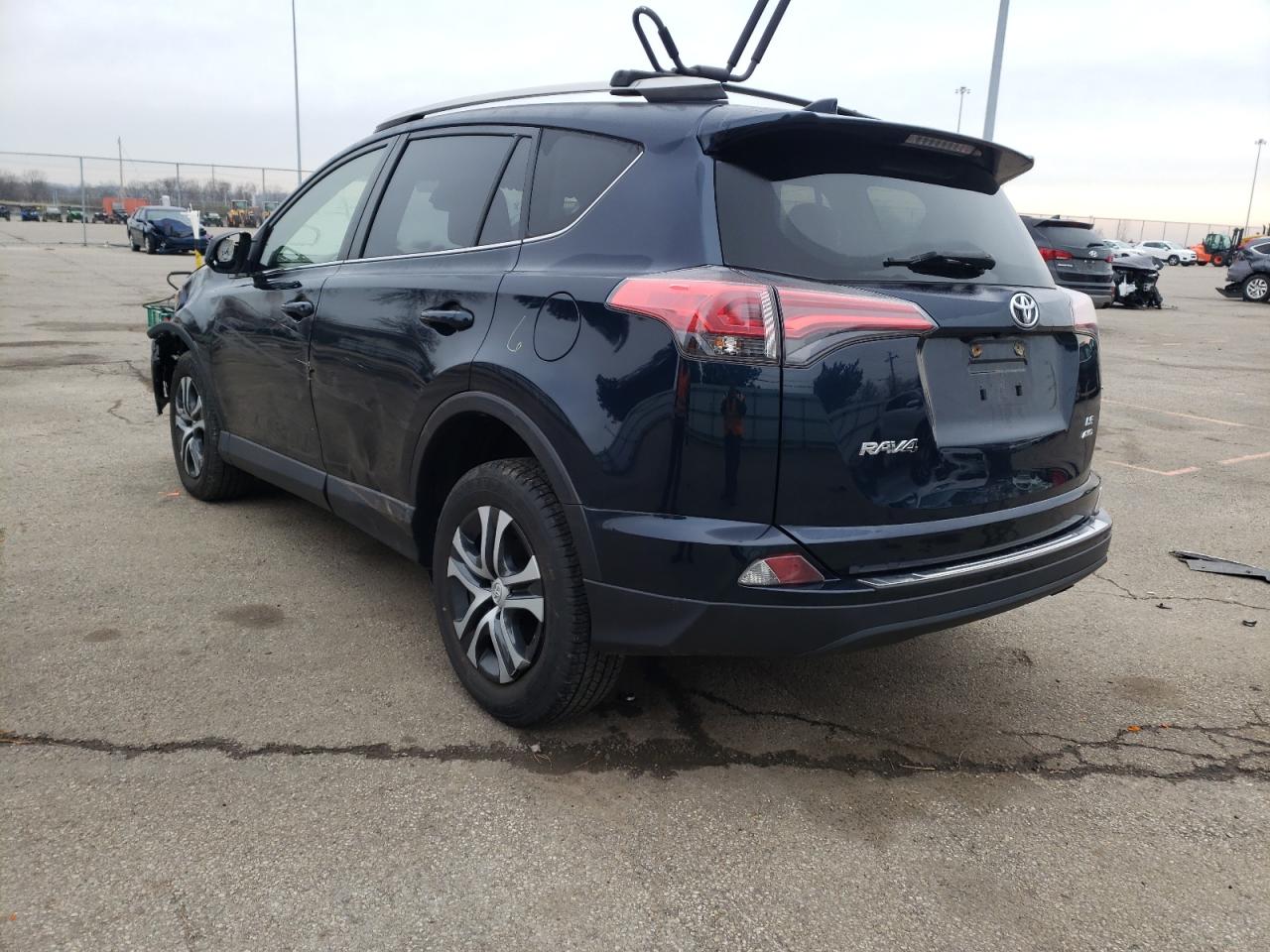 Photo 3 from auction – 2018 TOYOTA RAV4 LE with VIN JTMBFREV1JJ249631