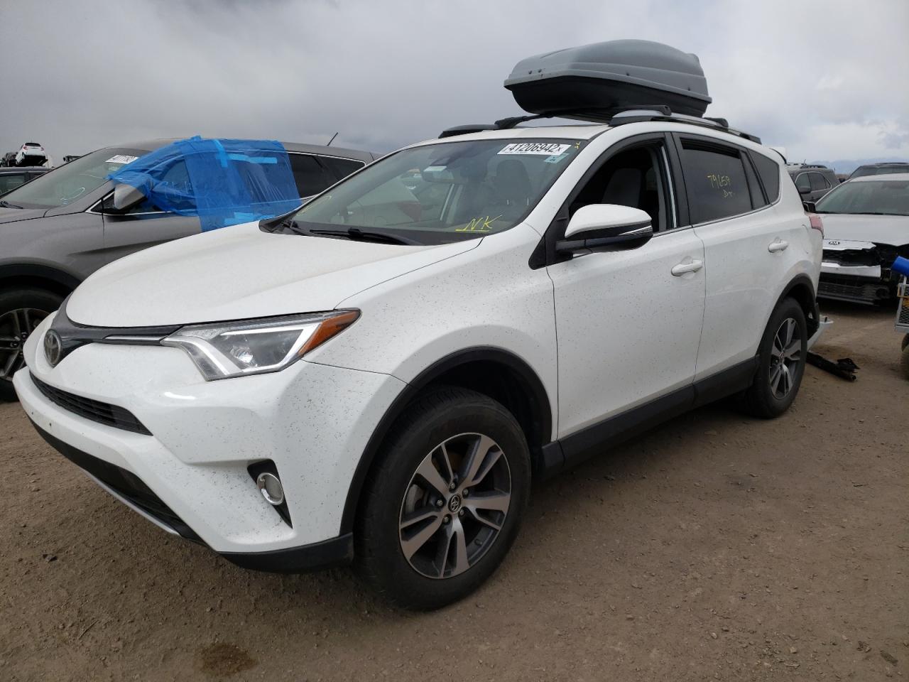 Photo 2 from auction – 2017 TOYOTA RAV4 XLE with VIN JTMRFREV4HJ126060