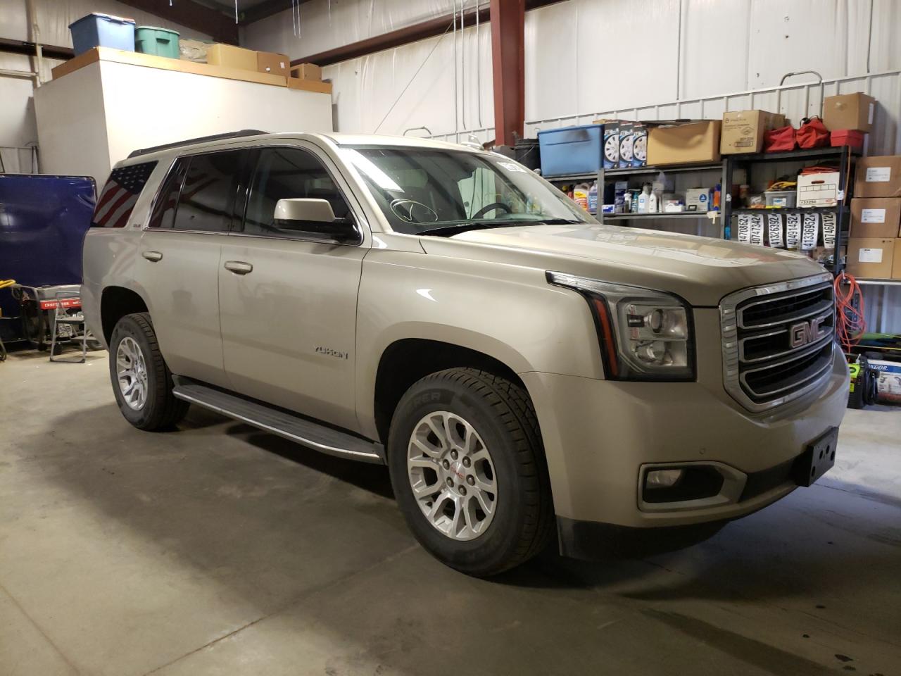 GMC YUKON SLE 2015 with VIN 1GKS2AKC1FR646740 - Photo from auction