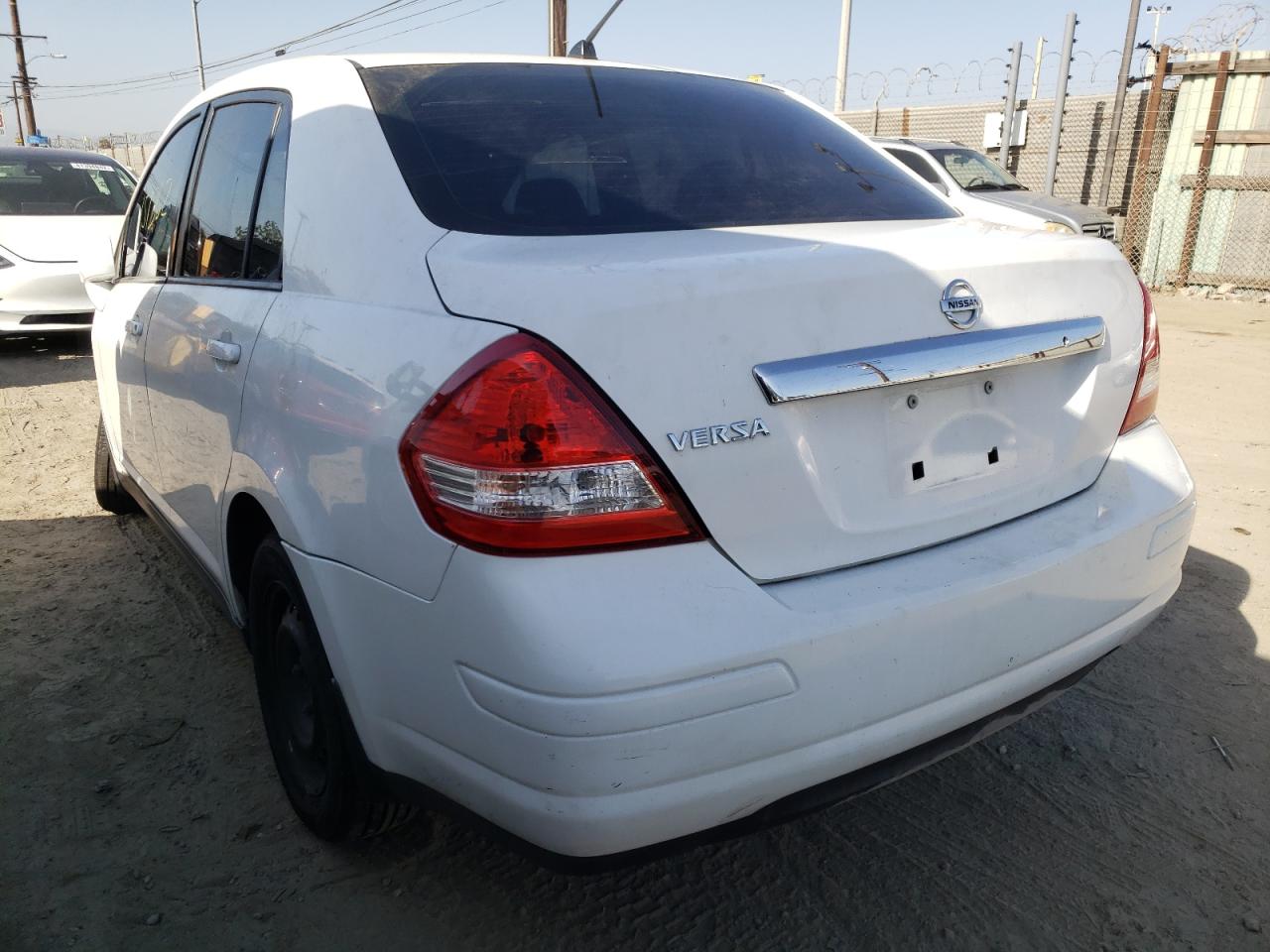 Photo 3 from auction – 2009 NISSAN VERSA with VIN 3N1BC11E09L406590