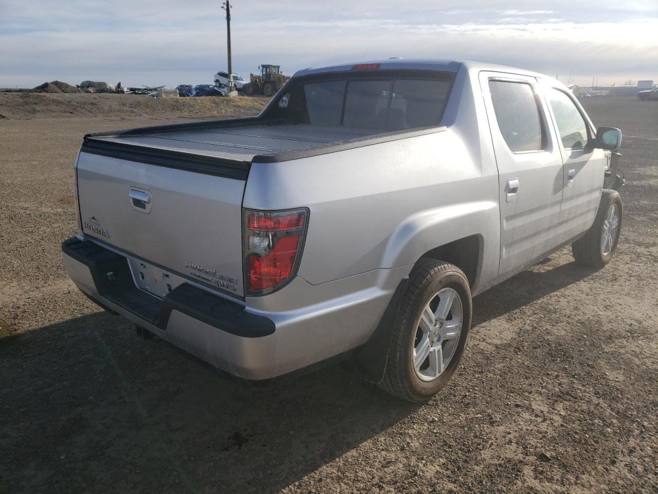 Photo 4 from auction – 2013 HONDA RIDGELINE with VIN 5FPYK1F59DB501926