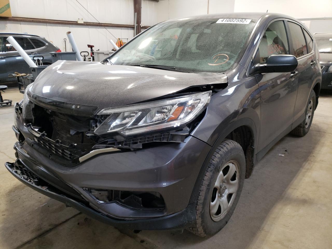 Photo 2 from auction – 2015 HONDA CR-V LX with VIN 2HKRM4H33FH116449