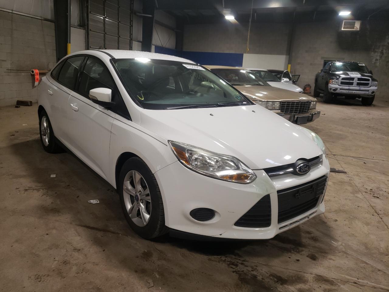 FORD FOCUS SE 2013 with VIN 1FADP3F26DL125828 - Photo from auction