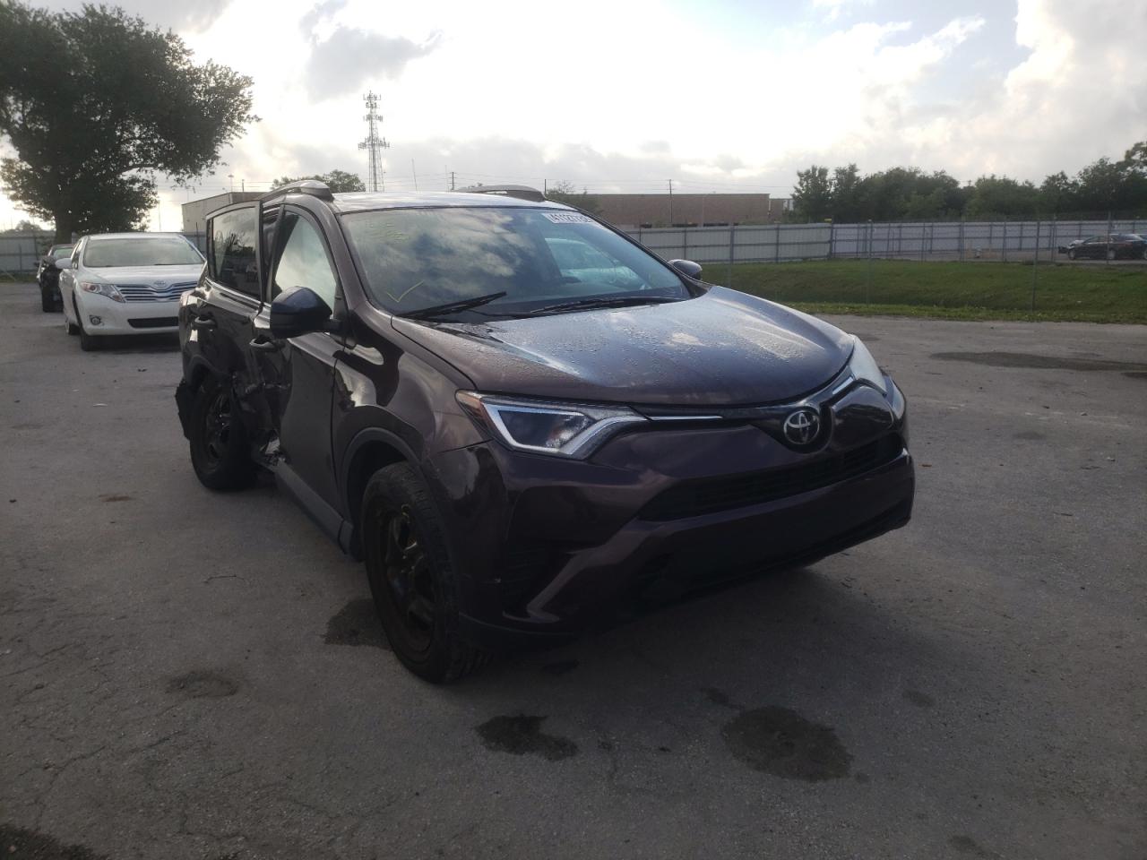 Photo 1 from auction – 2018 TOYOTA RAV4 LE with VIN 2T3ZFREV0JW438674