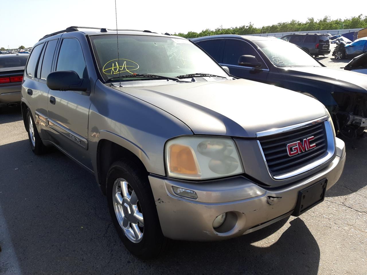 GMC ENVOY 2005 with VIN 1GKDT13S352125926 - Photo from auction
