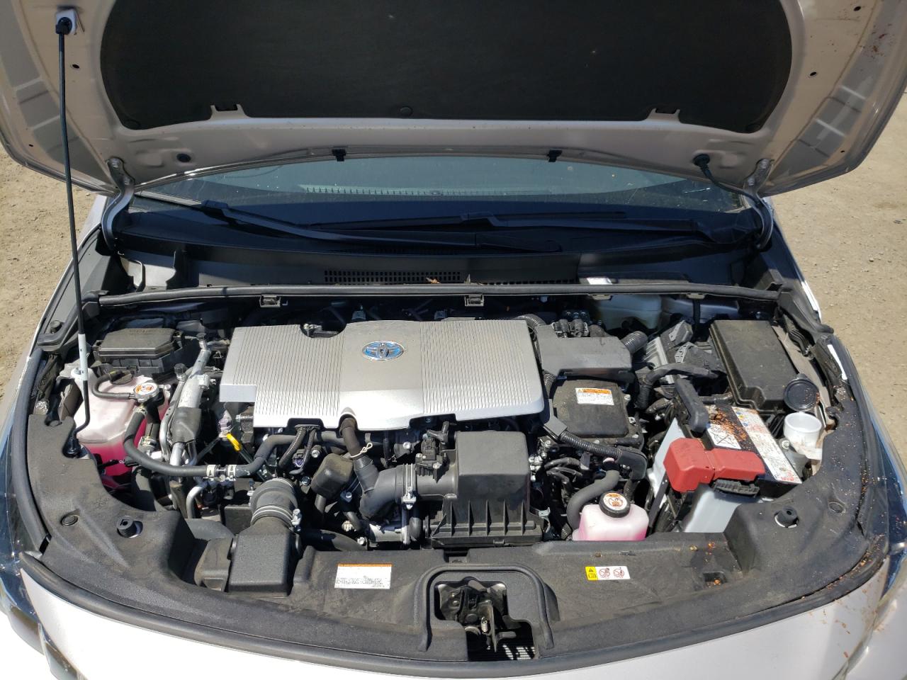 Photo 7 from auction – 2021 TOYOTA PRIUS PRIM with VIN JTDKAMFP3M3180256