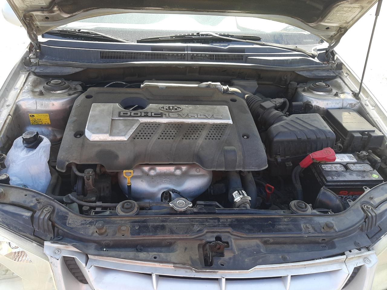 Photo 7 from auction – 2004 KIA SPECTRA LX with VIN KNAFE122545032058