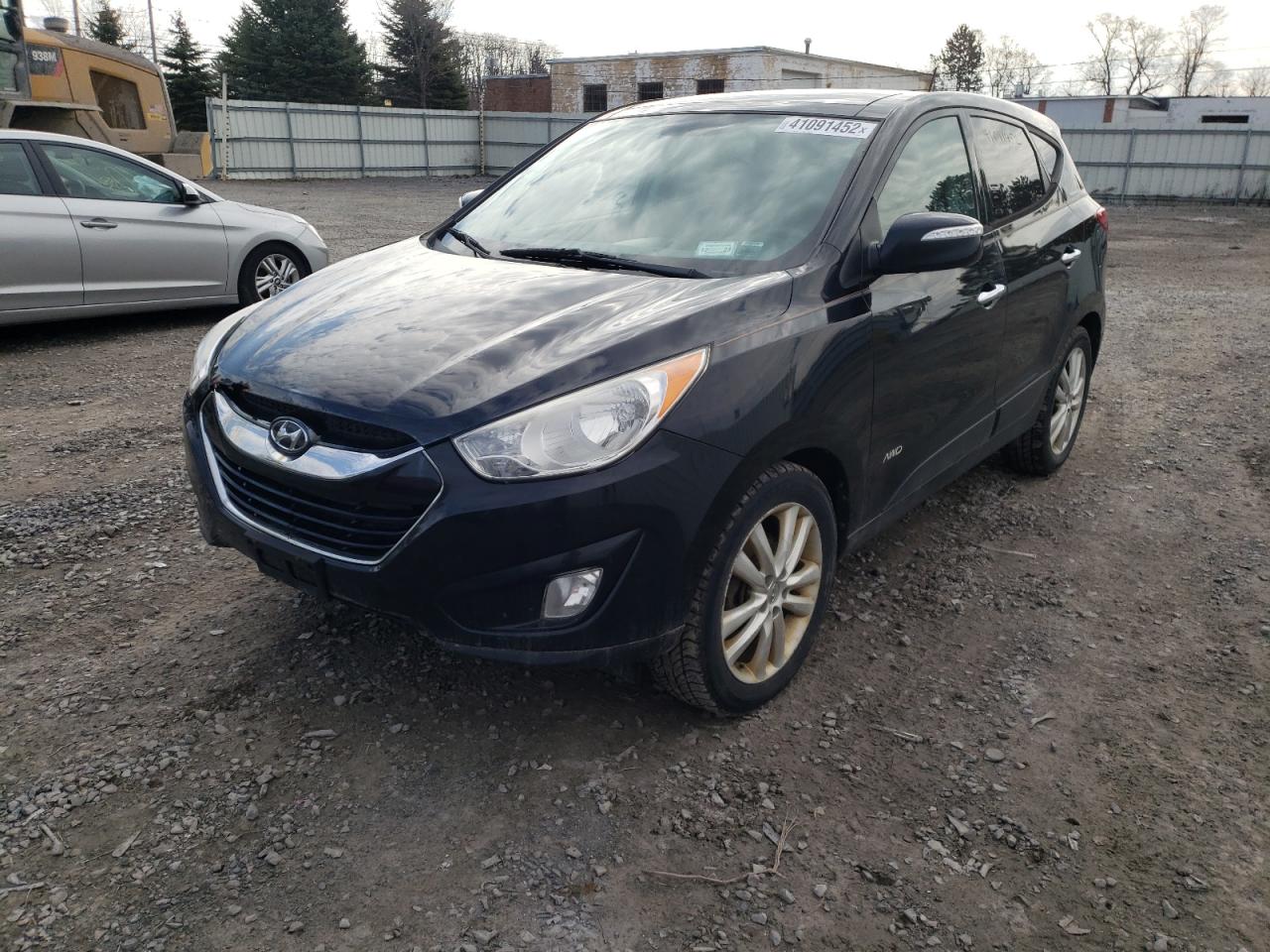 Photo 2 from auction – 2012 HYUNDAI TUCSON GLS with VIN KM8JUCAC6CU372793