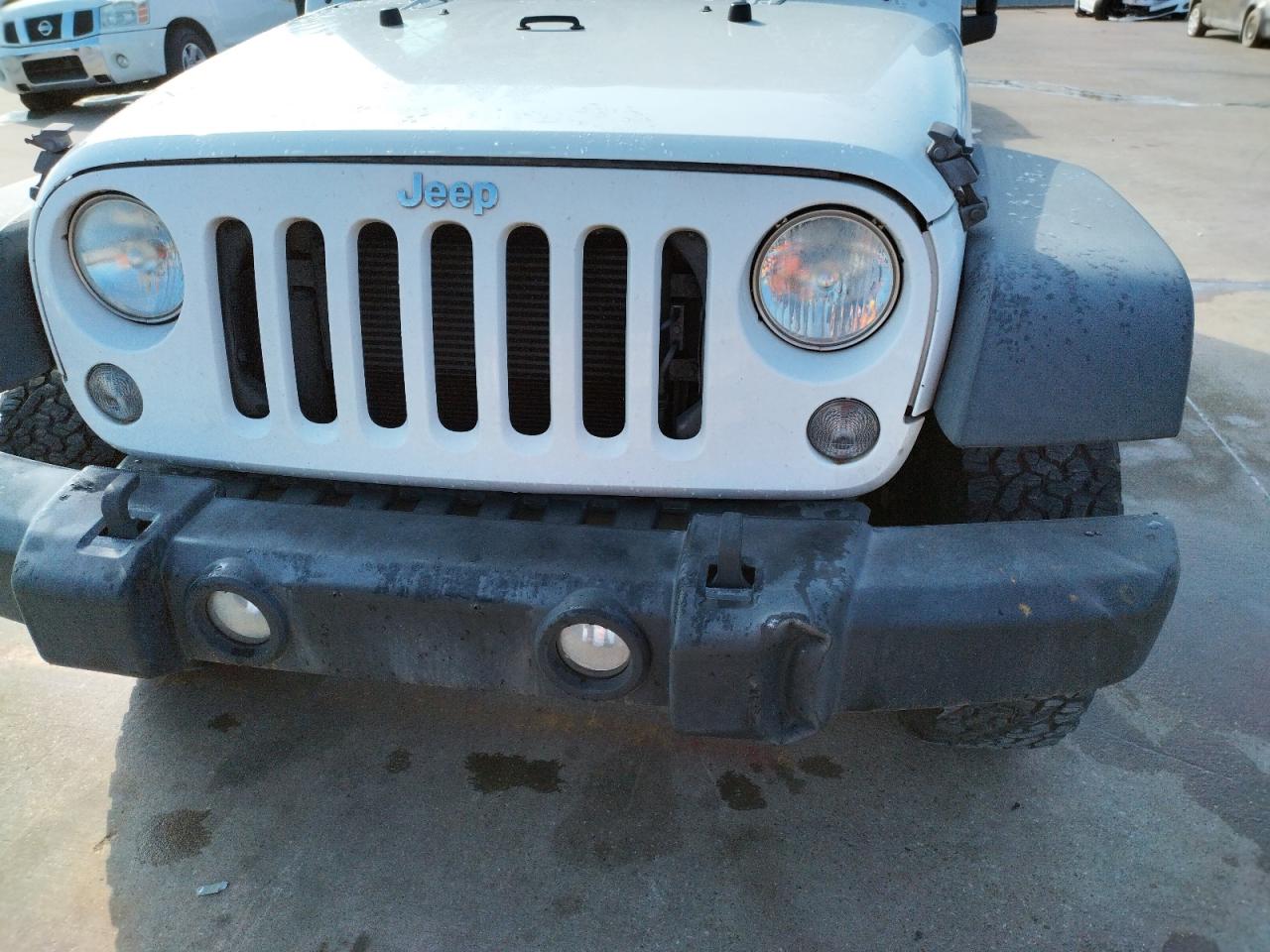 Photo 9 from auction – 2014 JEEP WRANGLER U with VIN 1C4BJWDG5EL245222